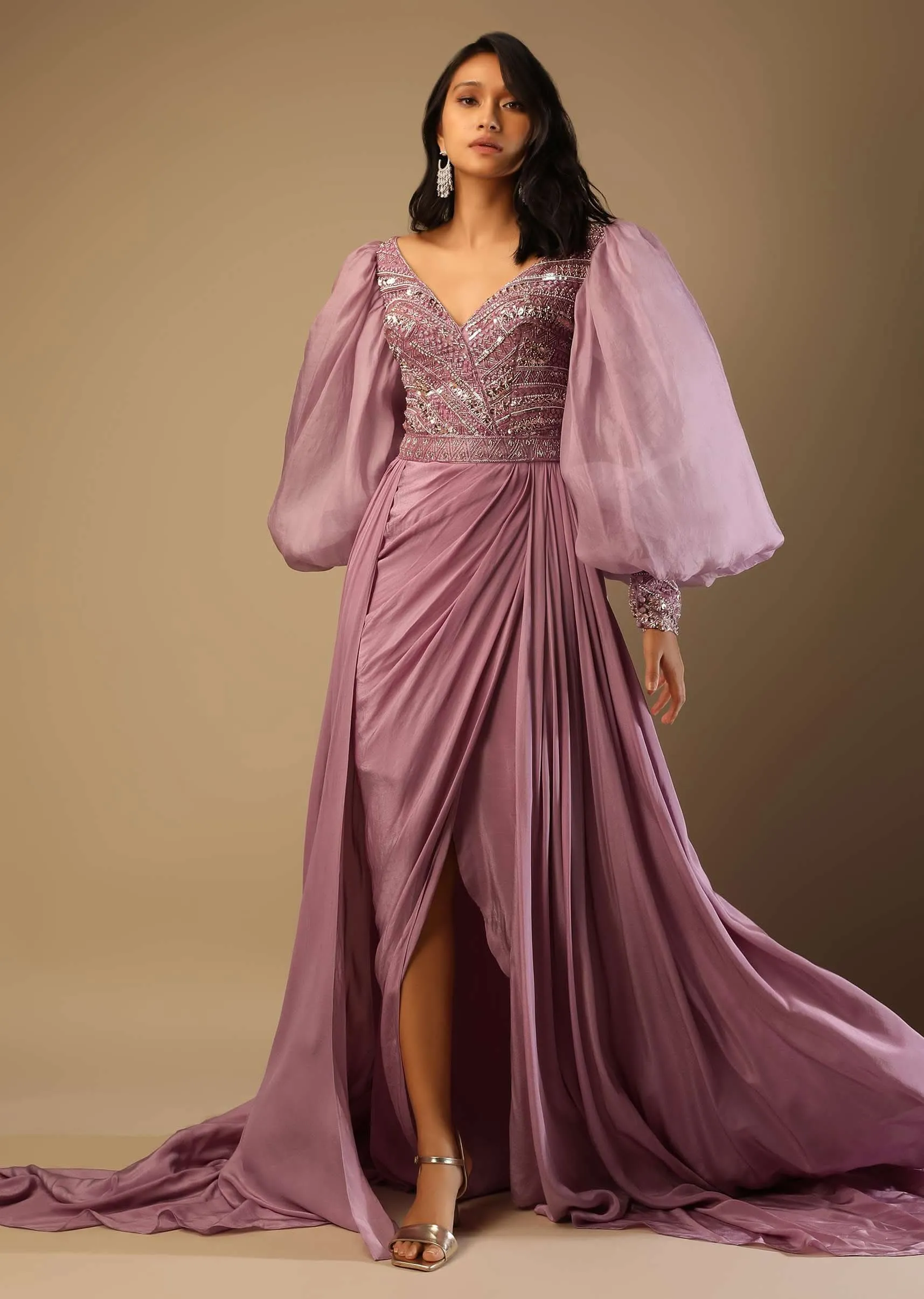 Frozen Mauve Gown With Hand Embroidered Bodice, Balloon Sleeves And A Long Trail