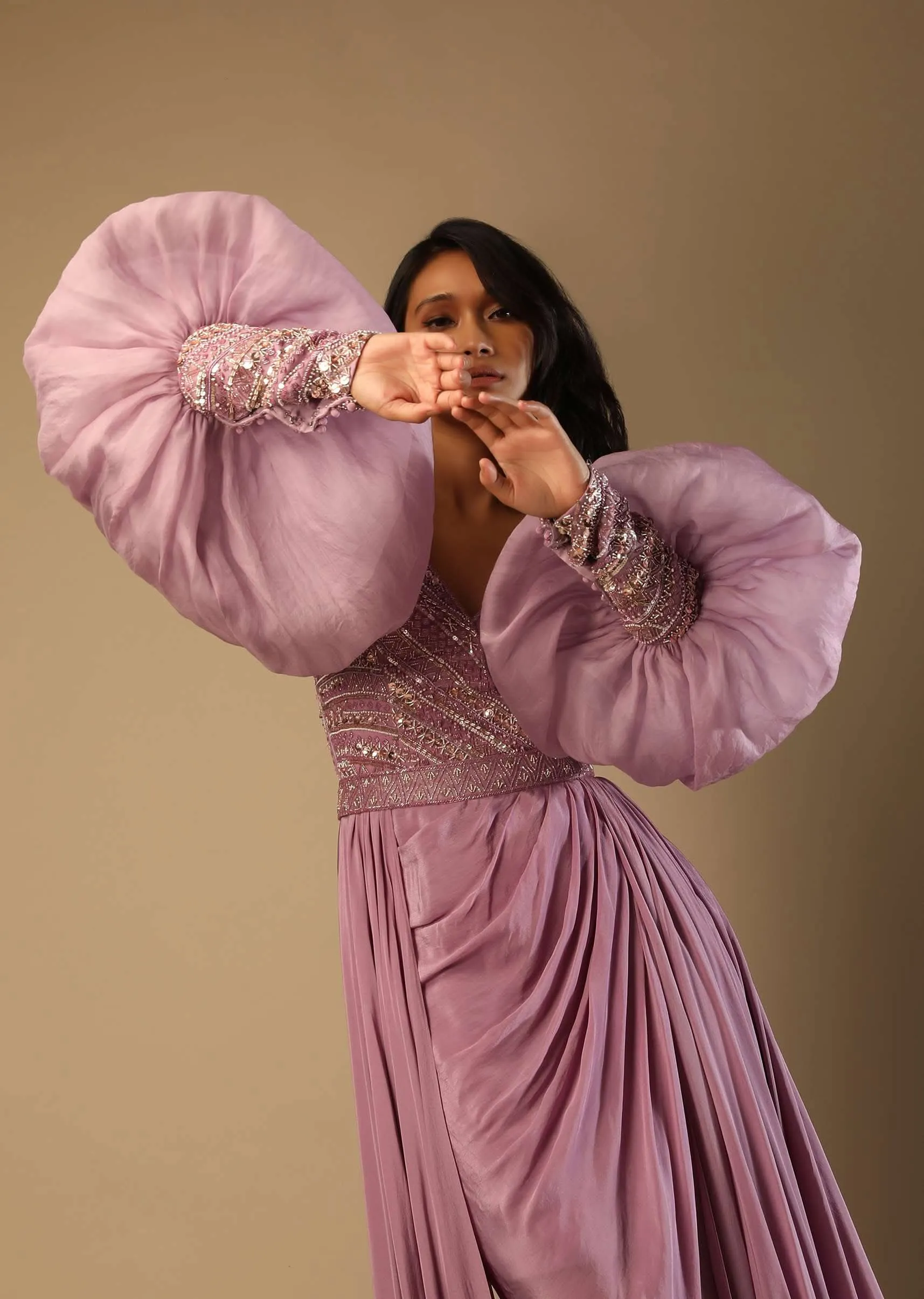 Frozen Mauve Gown With Hand Embroidered Bodice, Balloon Sleeves And A Long Trail