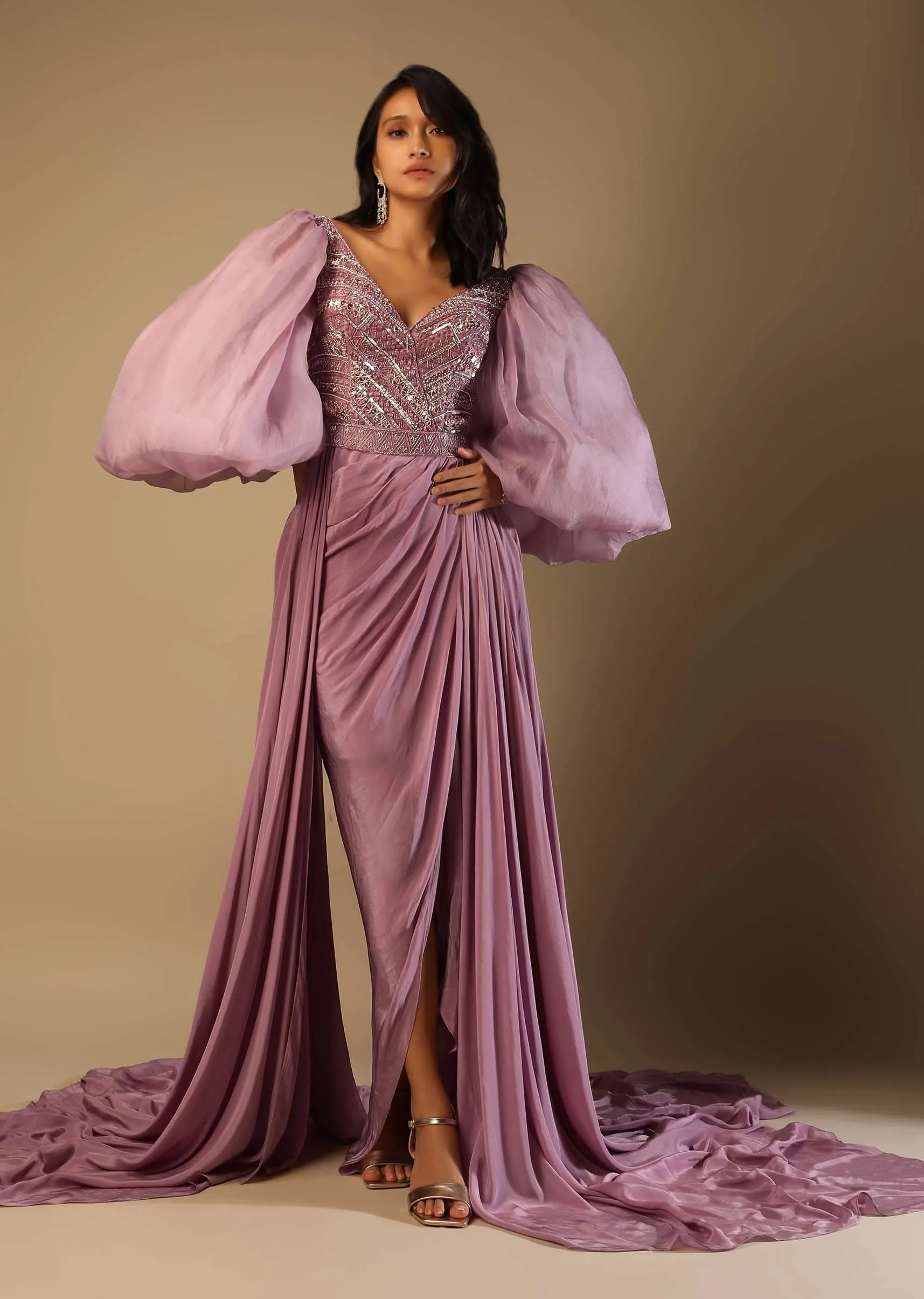 Frozen Mauve Gown With Hand Embroidered Bodice, Balloon Sleeves And A Long Trail